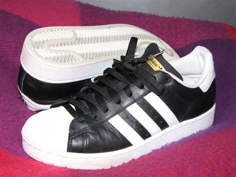 adidas with stripes only on one side|adidas striped leather shoes.